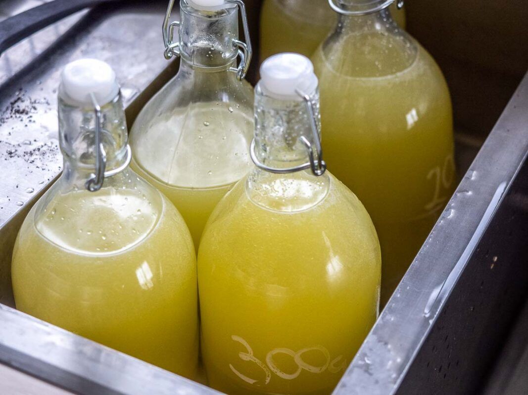 Image of diy distilling disolving sugar for limoncello in a water bath